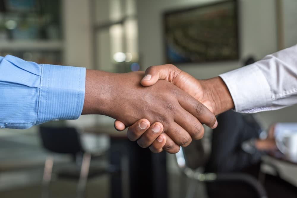 Recruitment team coordinating staffing assignments with a client company